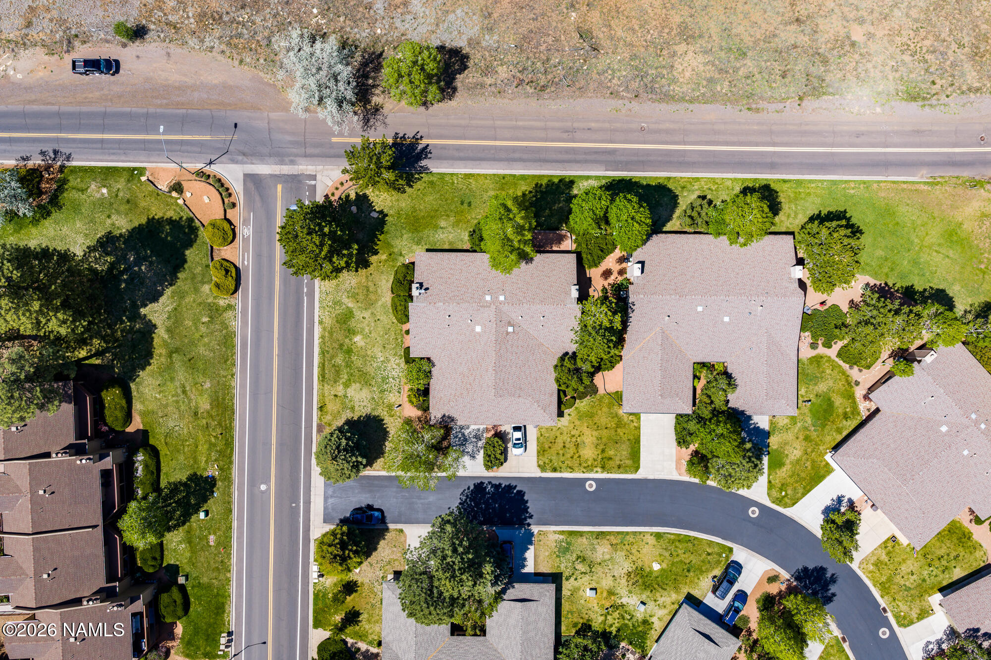 6000 East Laurel Loop, Unit 11 Flagstaff, AZ 86004 - Photo 46 of 54 an aerial view of a house with a garden