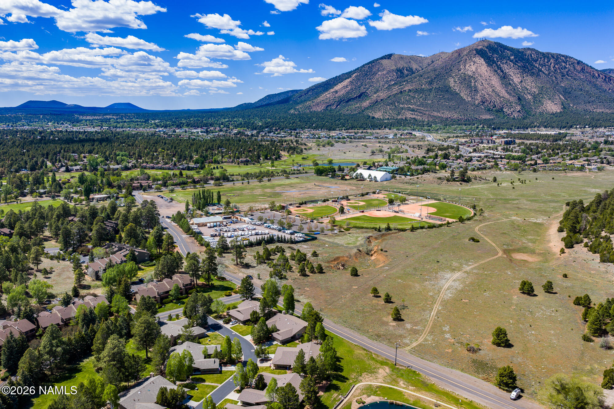 6000 East Laurel Loop, Unit 11 Flagstaff, AZ 86004 - Photo 50 of 54 a view of a lake with a mountain