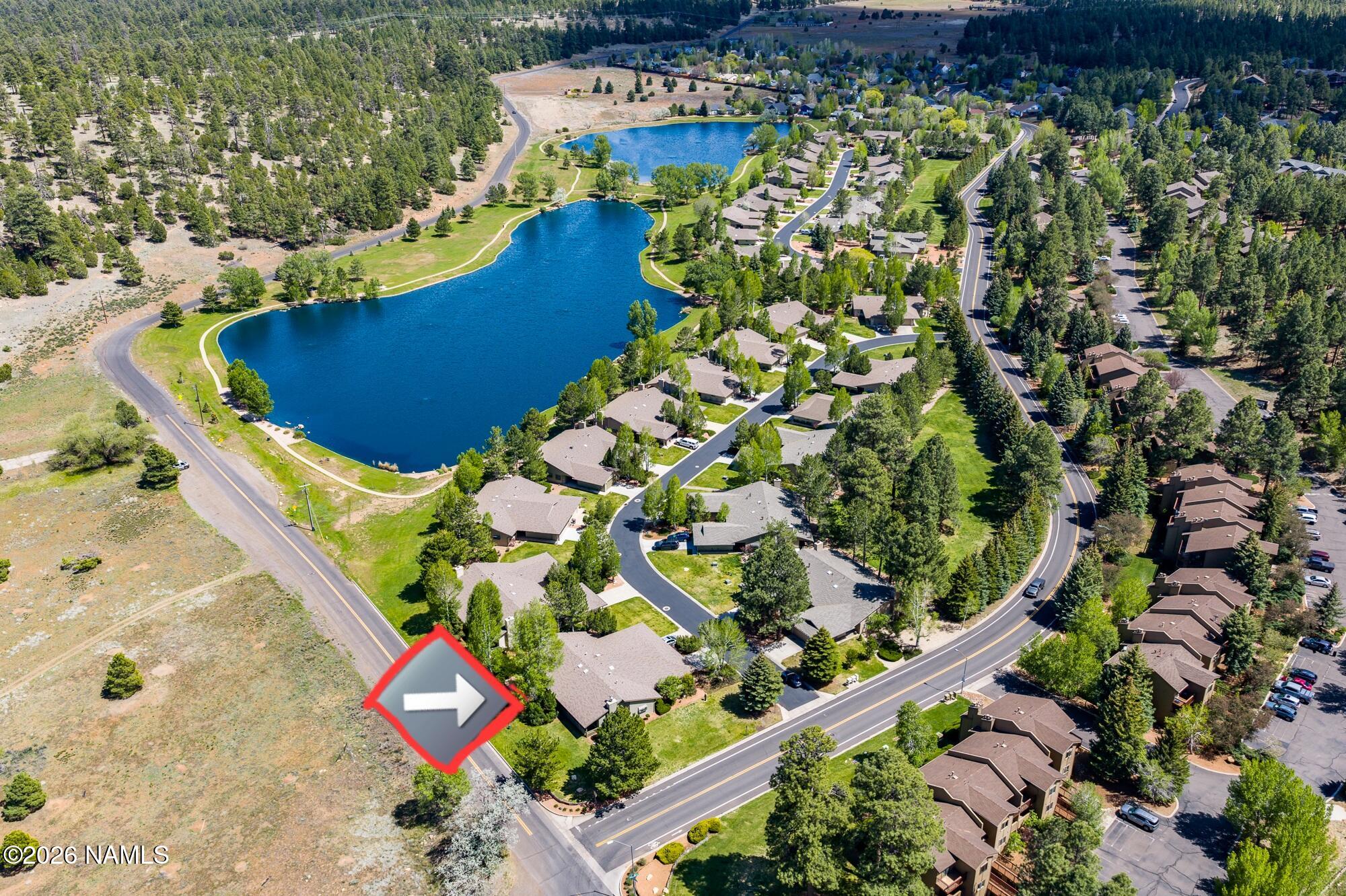 6000 East Laurel Loop, Unit 11 Flagstaff, AZ 86004 - Photo 5 of 54 an aerial view of a pool yard swimming pool and outdoor seating