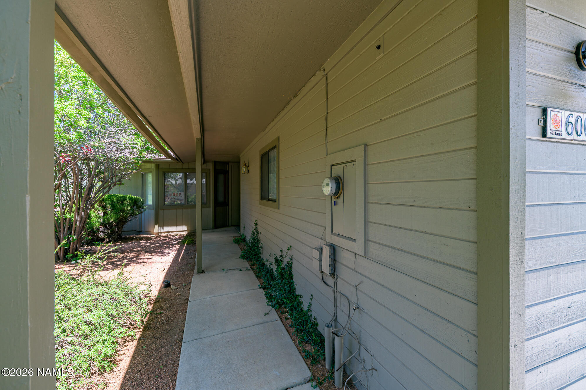 6000 East Laurel Loop, Unit 11 Flagstaff, AZ 86004 - Photo 8 of 54 a porch with seating space