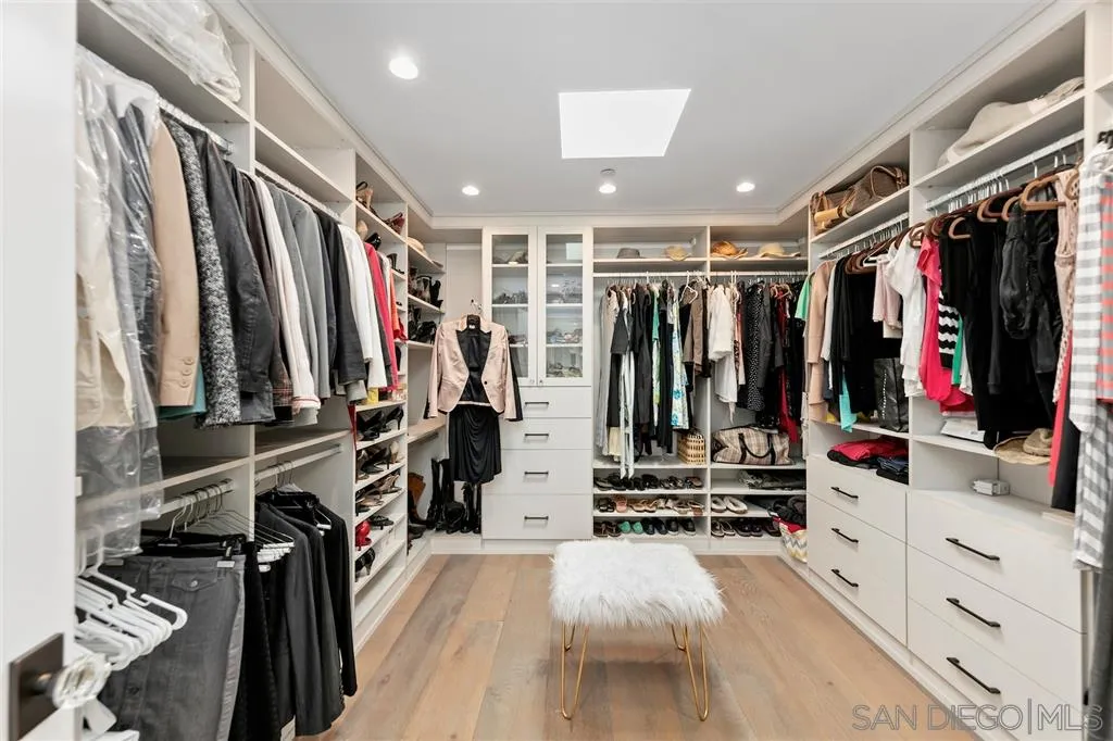 1622 Forest Way Del Mar, CA 92014 - Photo 11 of 25 a view of walk in closet with clothes