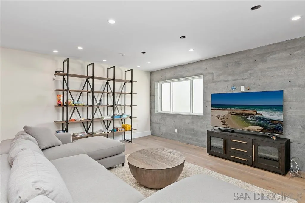 1622 Forest Way Del Mar, CA 92014 - Photo 15 of 25 a living room with furniture and a flat screen tv