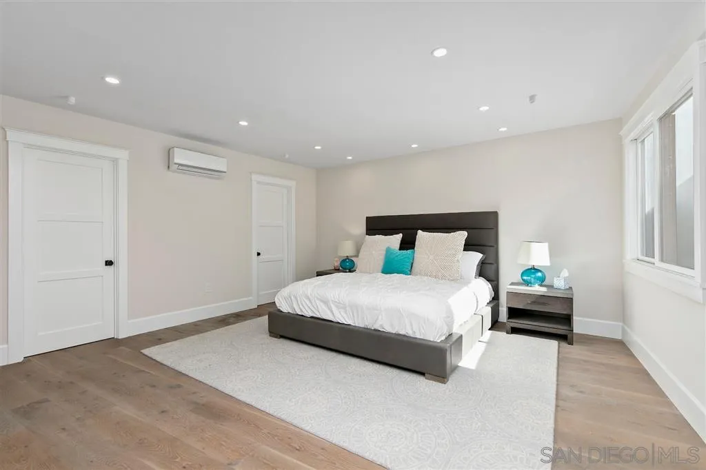 1622 Forest Way Del Mar, CA 92014 - Photo 16 of 25 a bedroom with a bed and a window