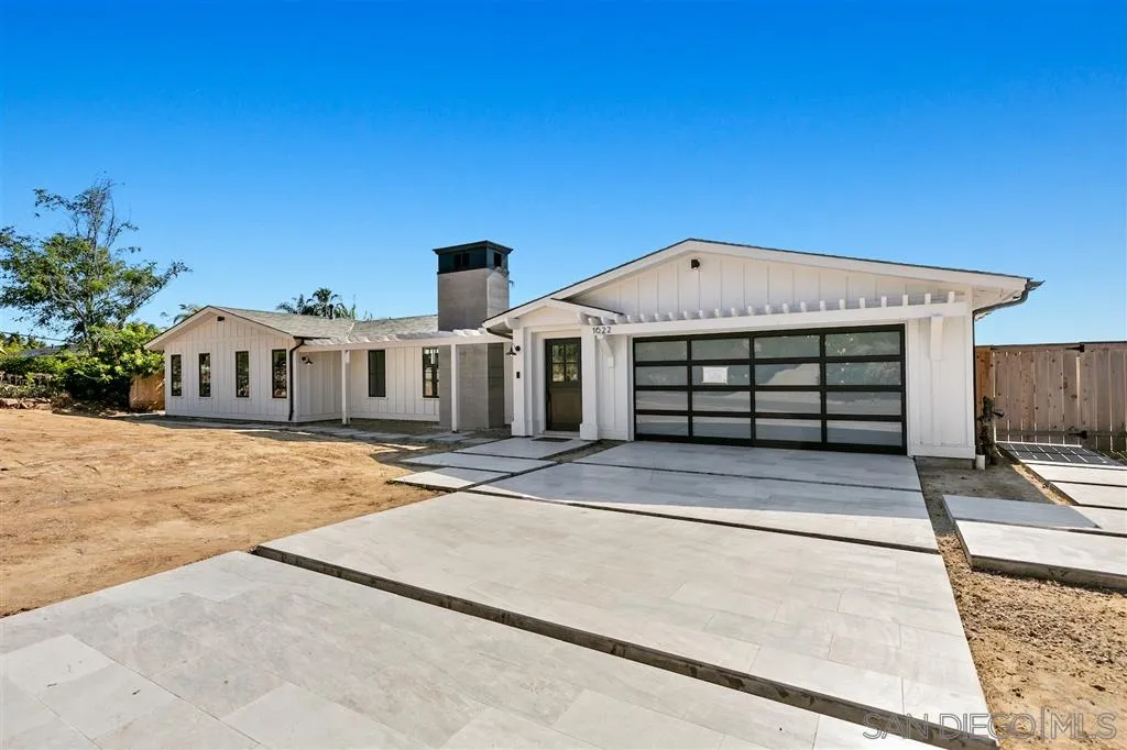 1622 Forest Way Del Mar, CA 92014 - Photo 19 of 25 a front view of a house with a garage