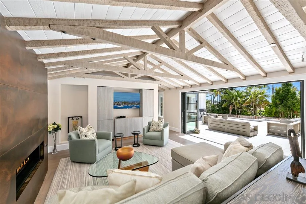 1622 Forest Way Del Mar, CA 92014 - Photo 2 of 25 a living room with furniture and a floor to ceiling window