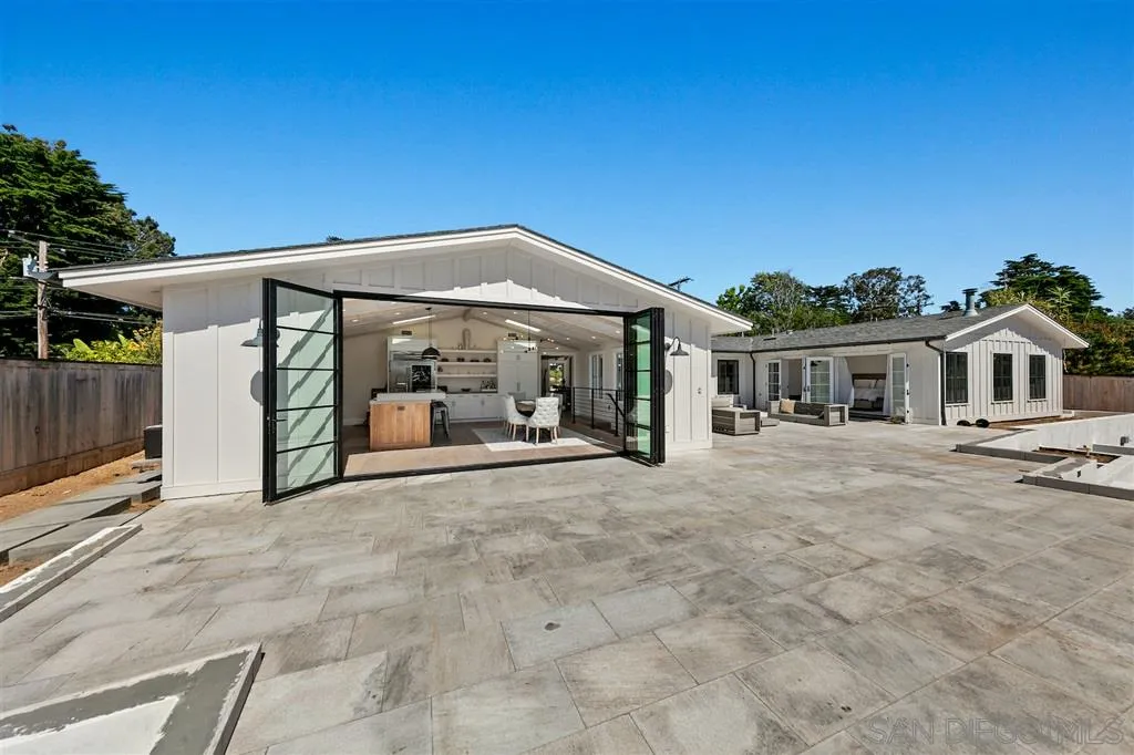 1622 Forest Way Del Mar, CA 92014 - Photo 22 of 25 a view of a house with backyard and porch