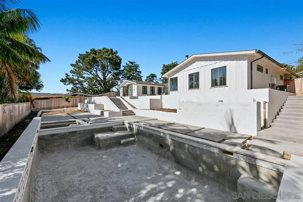 1622 Forest Way Del Mar, CA 92014 - Photo 24 of 25 a view of a white house with a yard and sitting area