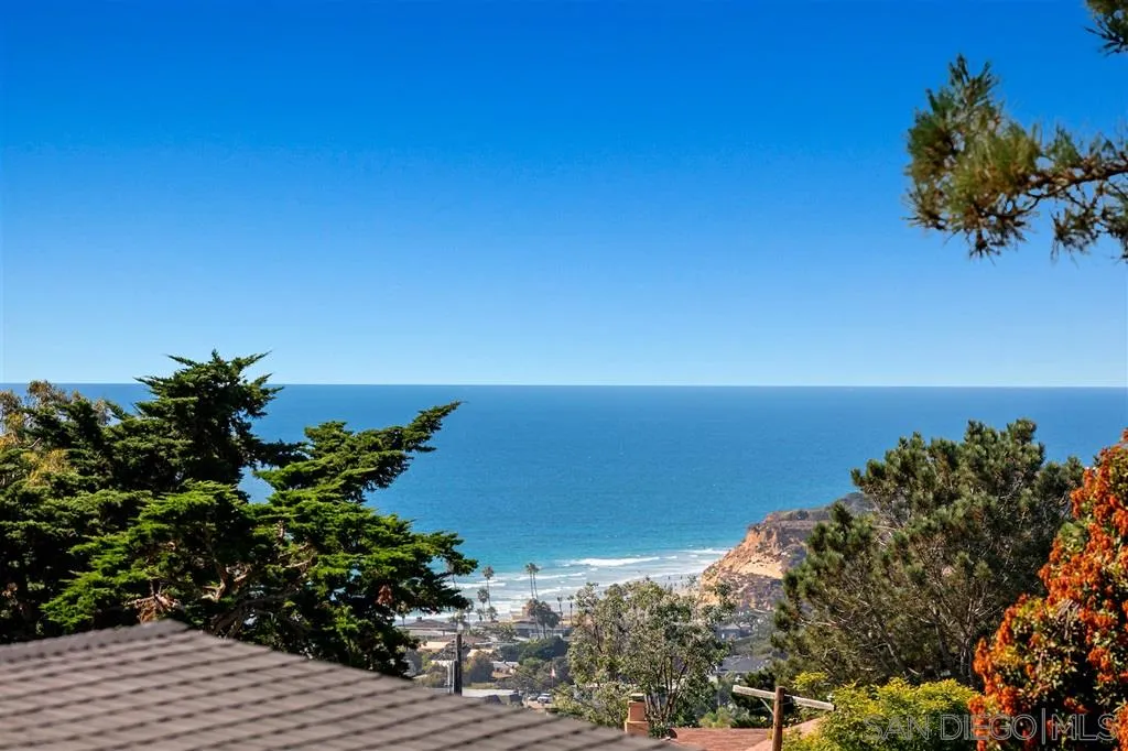 1622 Forest Way Del Mar, CA 92014 - Photo 3 of 25 a view of a lake with a building in front of it