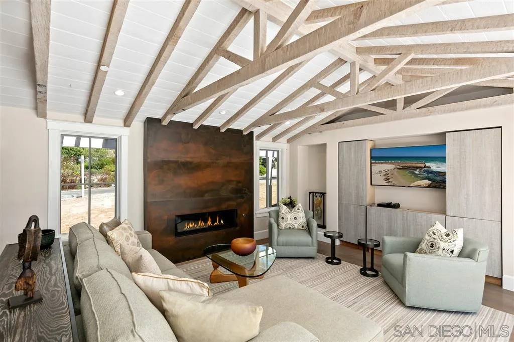 1622 Forest Way Del Mar, CA 92014 - Photo 4 of 25 a living room with furniture and a flat screen tv