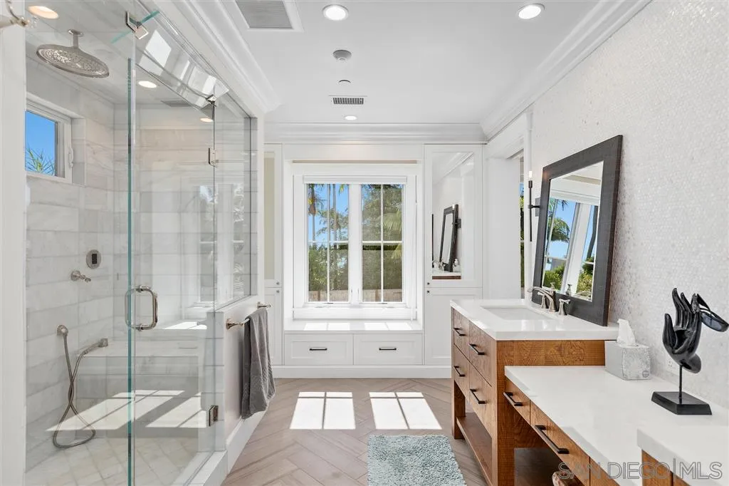 1622 Forest Way Del Mar, CA 92014 - Photo 9 of 25 a bathroom with a tub sink vanity and mirror