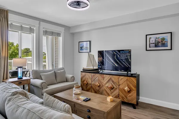 a living room with furniture and a window