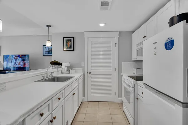 a bathroom with a toilet and a vanity