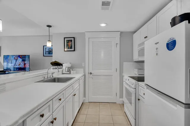a bathroom with a toilet and a vanity