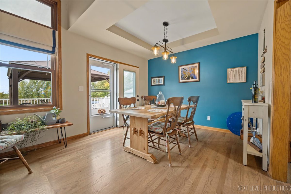 4381 North St Route Leland, IL 60531 - Photo 19 of 36 a view of a dining room with furniture window and wooden floor