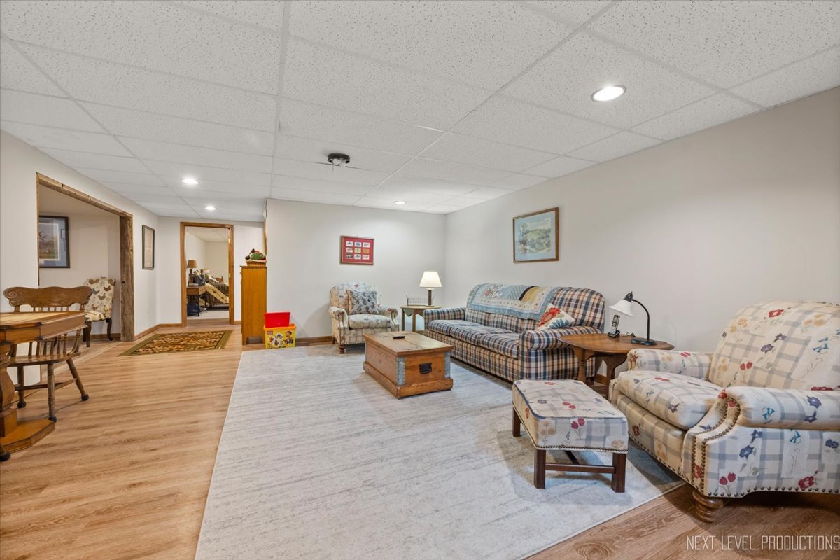4381 North St Route Leland, IL 60531 - Photo 27 of 36 a living room with furniture and wooden floor