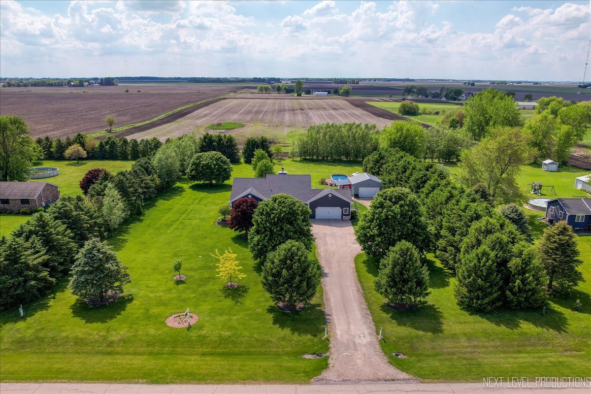 4381 North St Route Leland, IL 60531 - Photo 7 of 36 a view of a lake with a yard