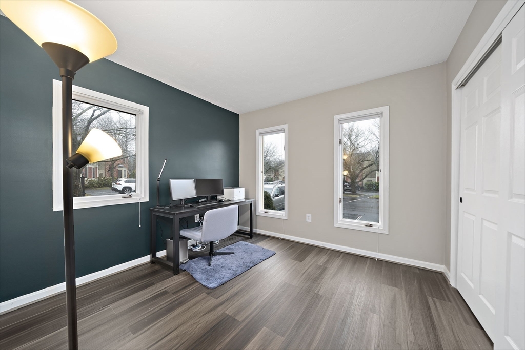 22 Union Square, Unit 22 Randolph, MA 02368 - Photo 24 of 28 a workspace with wooden floor and a window