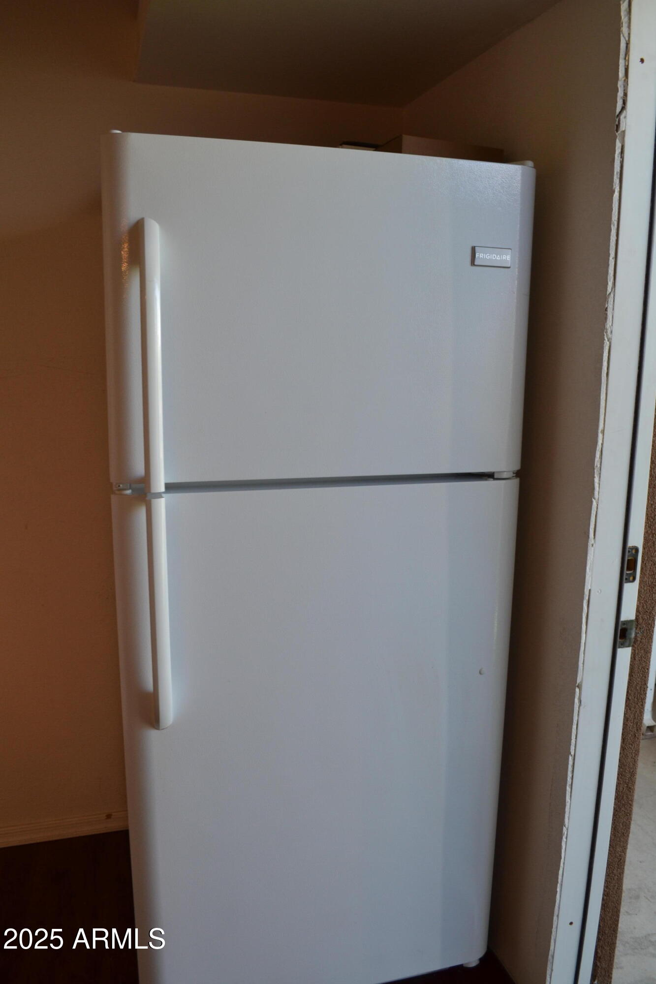 17200 West Bell Road, Unit 454 Surprise, AZ 85374 - Photo 13 of 24 a close view of a refrigerator in kitchen
