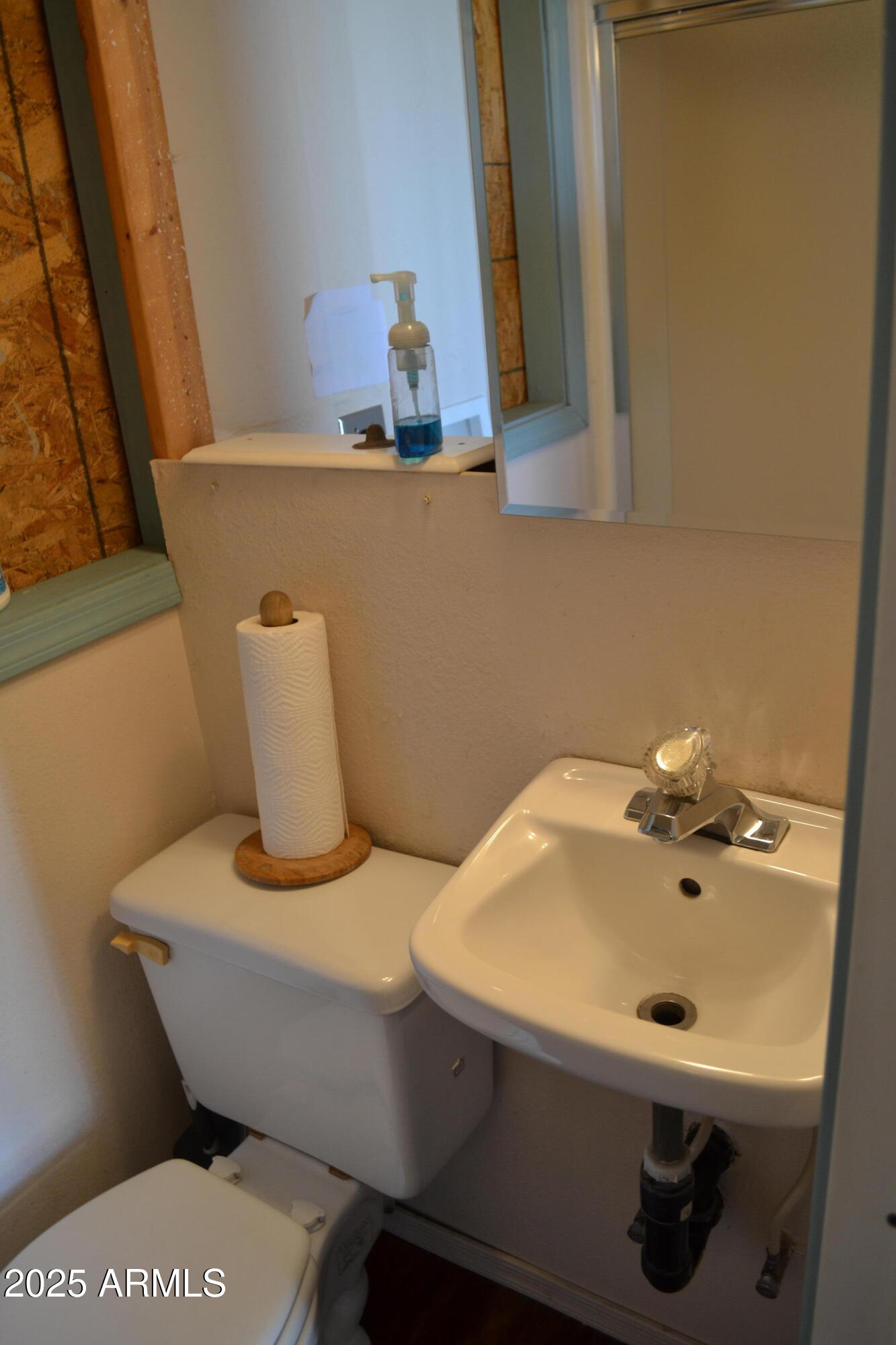 17200 West Bell Road, Unit 454 Surprise, AZ 85374 - Photo 14 of 24 a bathroom with a sink and a mirror
