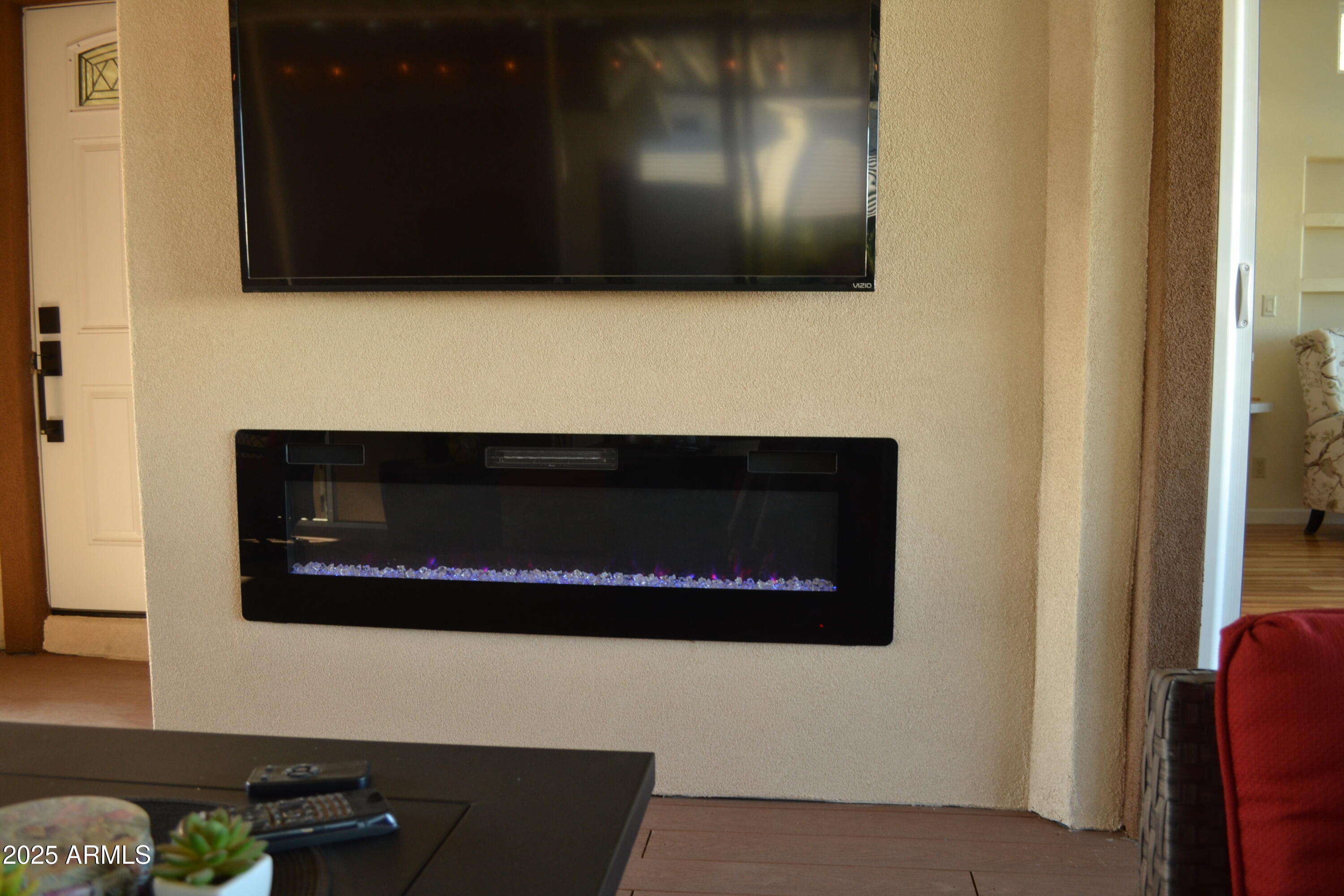 17200 West Bell Road, Unit 454 Surprise, AZ 85374 - Photo 17 of 24 a bathroom with a stove and a microwave