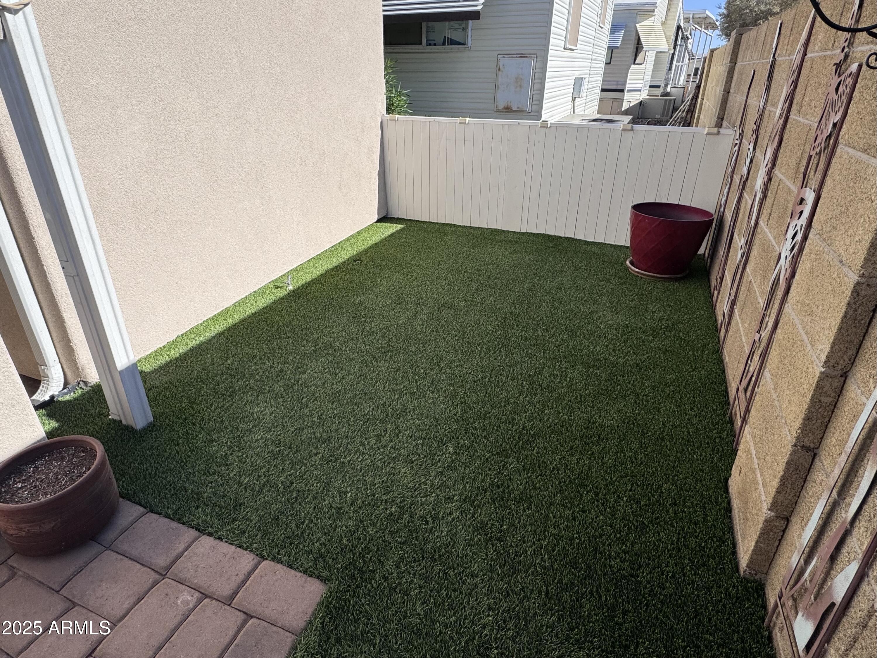17200 West Bell Road, Unit 454 Surprise, AZ 85374 - Photo 21 of 24 a view of an outdoor space and a yard
