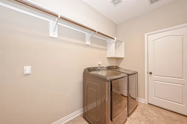 a view of room with wooden floor