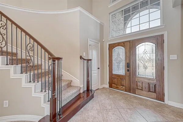 a bathroom with a sink vanity and a toilet