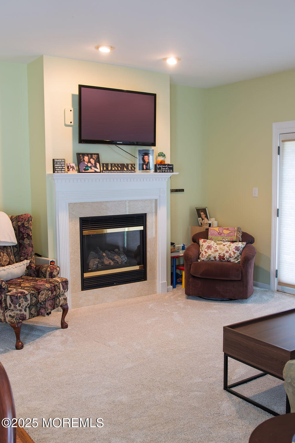 108 Hyannis Court Galloway Township, NJ 08205 - Photo 11 of 22 a living room with furniture and a fireplace