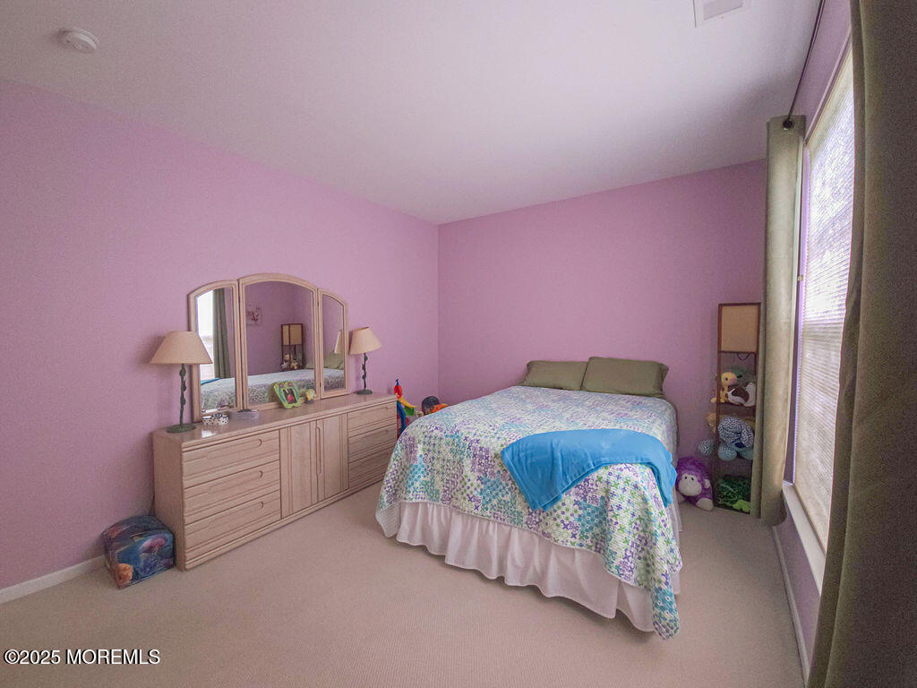 108 Hyannis Court Galloway Township, NJ 08205 - Photo 16 of 22 a bedroom with a bed and a window