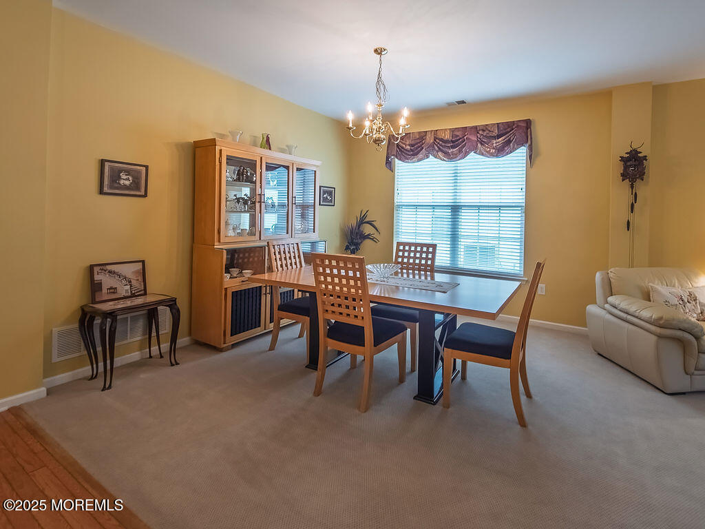 108 Hyannis Court Galloway Township, NJ 08205 - Photo 7 of 22 a dining room with furniture and window
