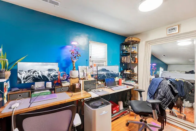 a room with furniture a rug and a chandelier