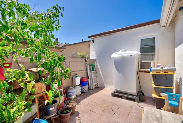 a backyard of a house with seating space