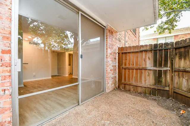 a view of yard with patio