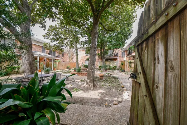 a view of yard with patio