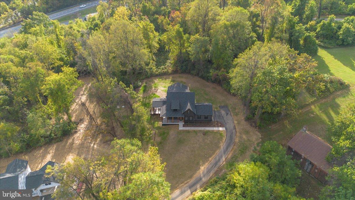 5409 Reeder Lane Frederick, MD 21702 - Photo 60 of 70 Serene retreat nestled among lush greenery.