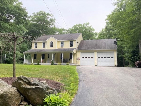 30 Halfrey Road Hubbardston, MA 01452 - Photo 1 of 42 a front view of a house with a garden and trees