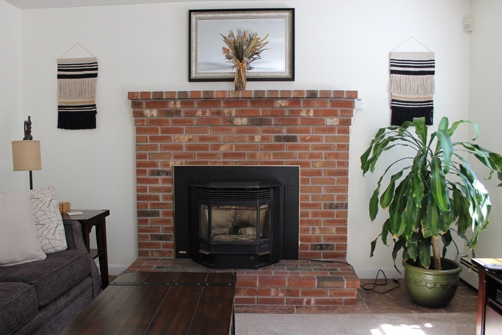 30 Halfrey Road Hubbardston, MA 01452 - Photo 12 of 42 a living room with furniture and a potted plant