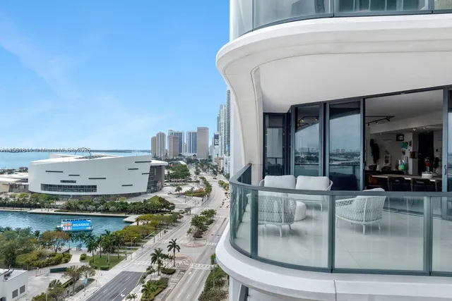 a picture of a living room with a fireplace