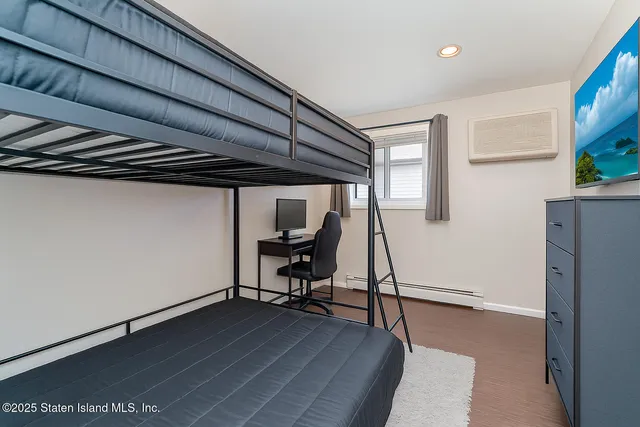 a kitchen with stainless steel appliances granite countertop a refrigerator and a stove