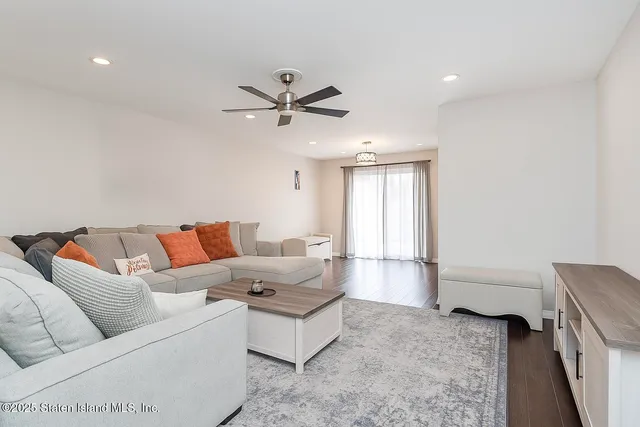 a bedroom with a bed and a chair