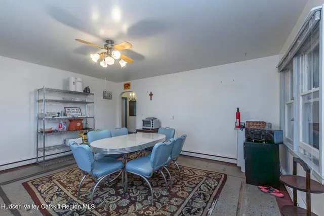 a view of a dining room with furniture