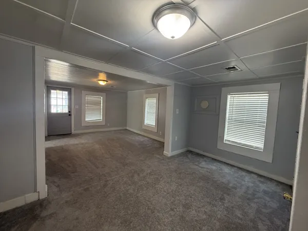 an empty room with windows