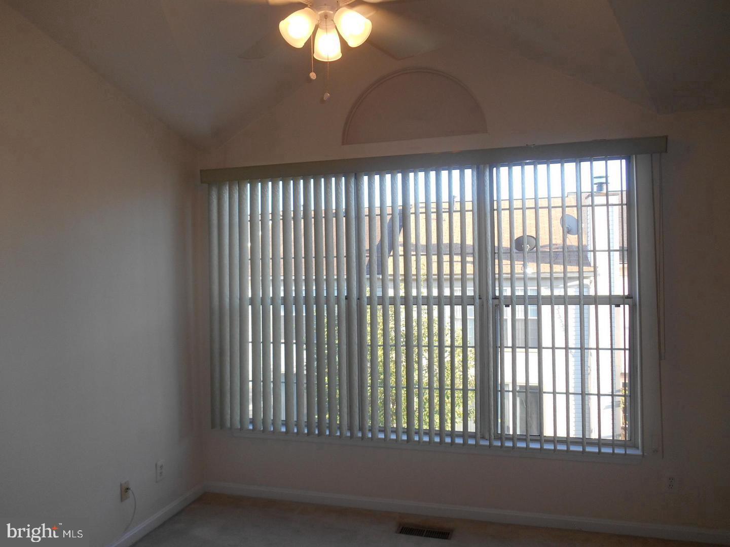 6359 Battlement Way Alexandria, VA 22312 - Photo 11 of 19 a view of an empty room with a window