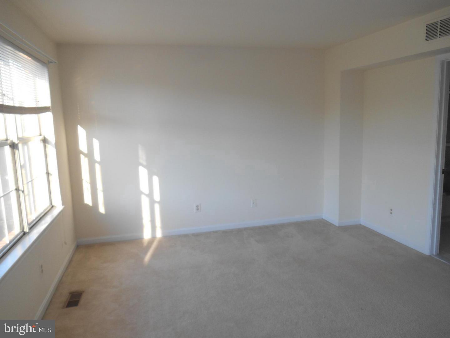 6359 Battlement Way Alexandria, VA 22312 - Photo 12 of 19 an empty room with windows