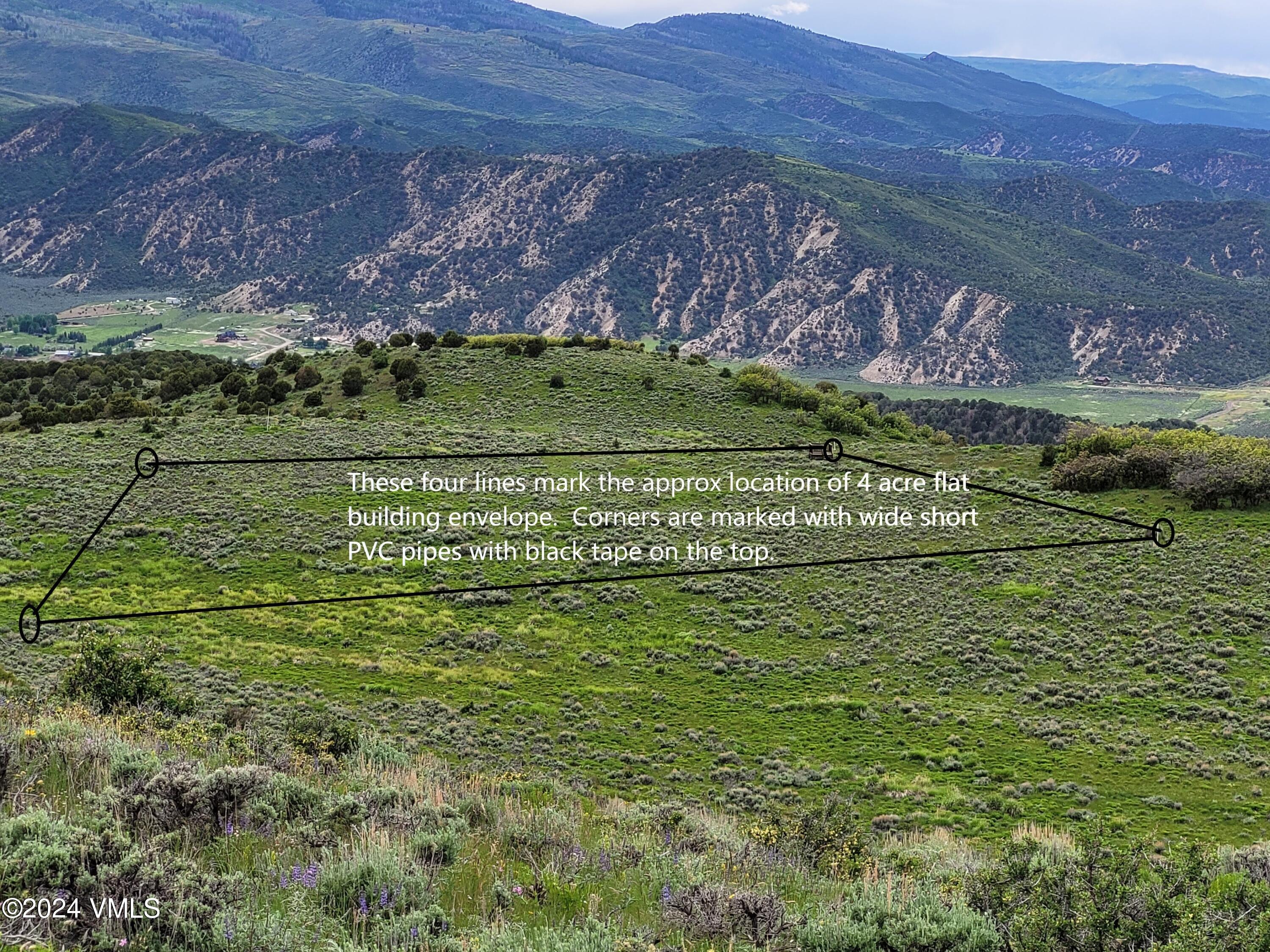 3566 Territory Trail Edwards, CO 81632 - Photo 2 of 14 a view of a golf course with a garden