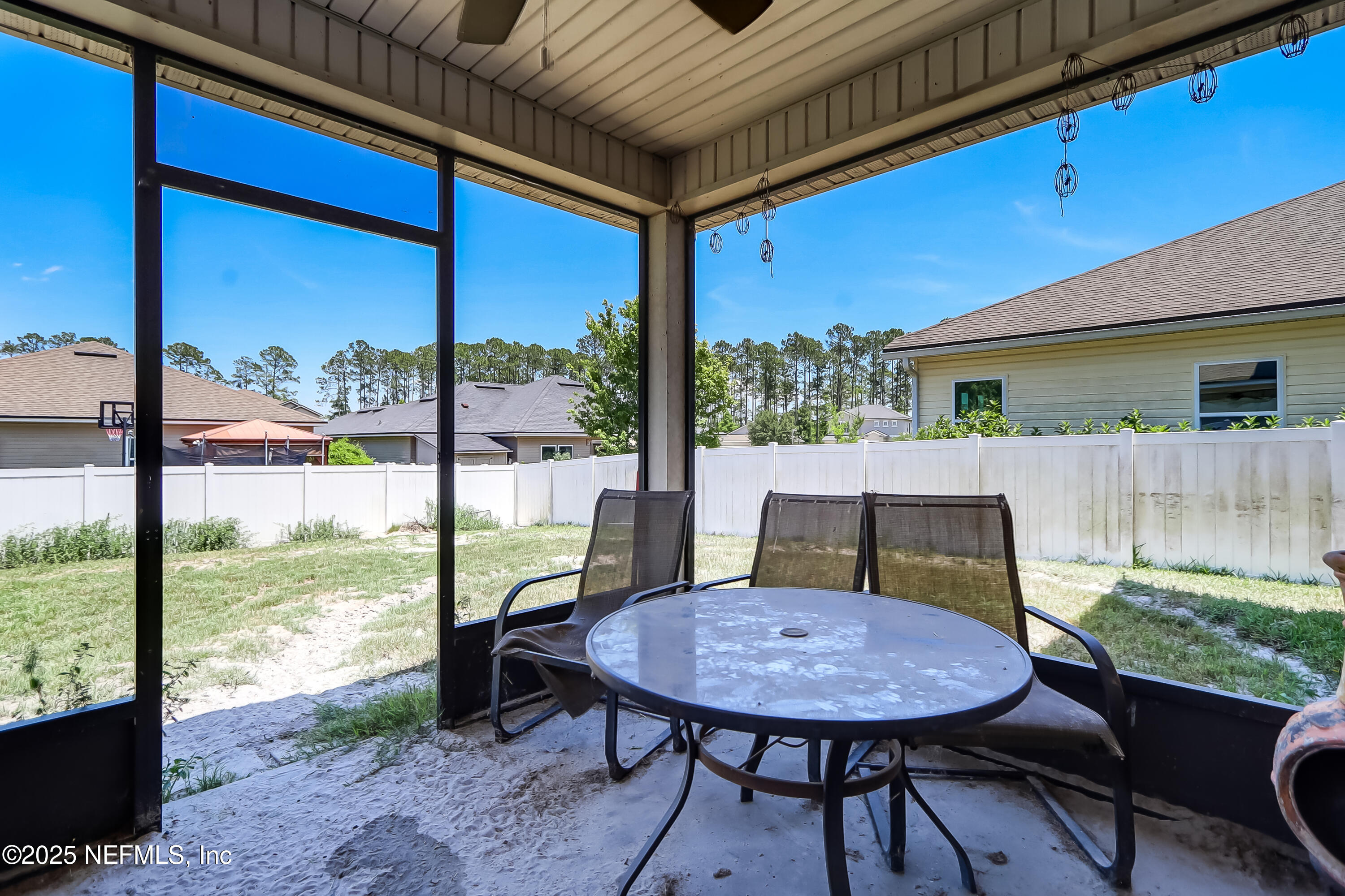 1071 Wetland Ridge Circle Middleburg, FL 32068 - Photo 38 of 41 a view of a porch with furniture and a yard