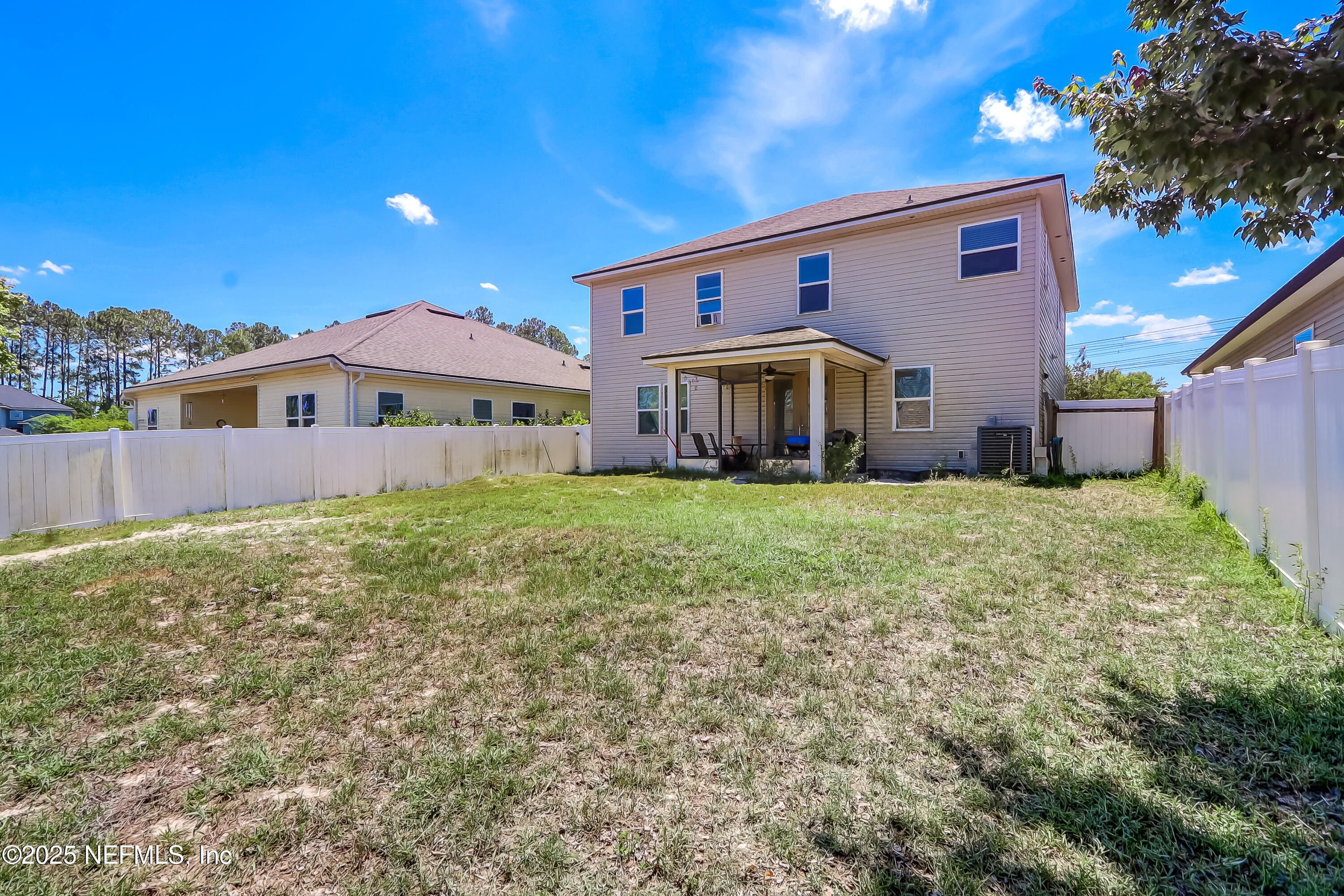 1071 Wetland Ridge Circle Middleburg, FL 32068 - Photo 41 of 41 a front view of a house with a yard
