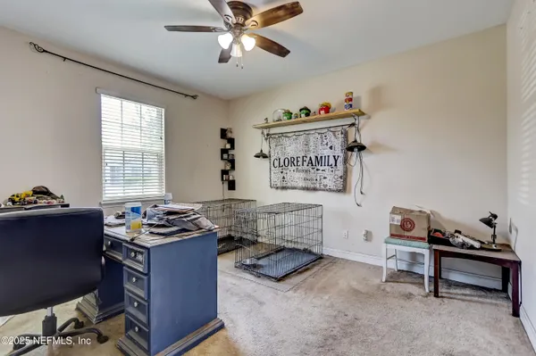 a workspace with furniture and window