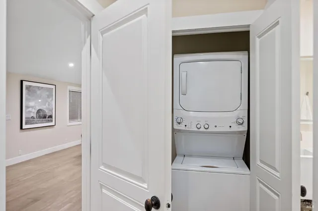 a view of bathroom with washer and dryer