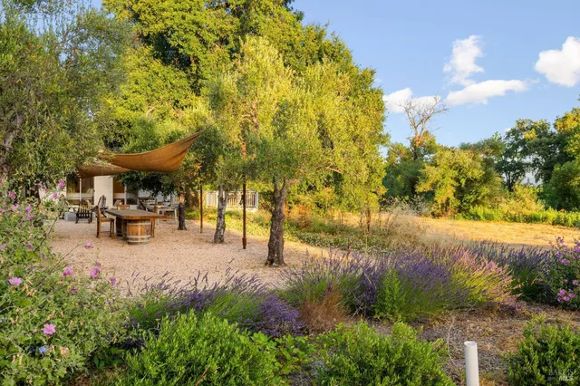 a view of swimming pool with a patio